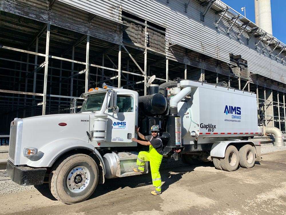 AIMS Worker outside of truck